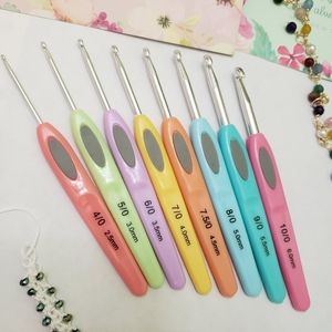 8 crochet hooks , plastic and aluminum,  NEW